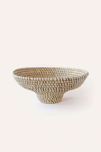 Decorative bowl with a mosaic pattern on a white background