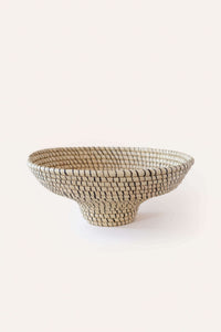 Decorative bowl with a mosaic pattern on a white background