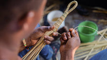 {Imperfections} Green Yellow Woven African Hand Fan