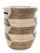 Woven basket with a checkered pattern on a white background