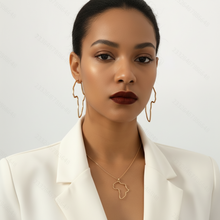 Woman wearing gold earrings and necklace with a white background