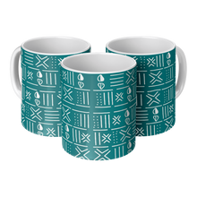 Three ceramic coffee mugs with teal blue and white African pattern sitting side by side