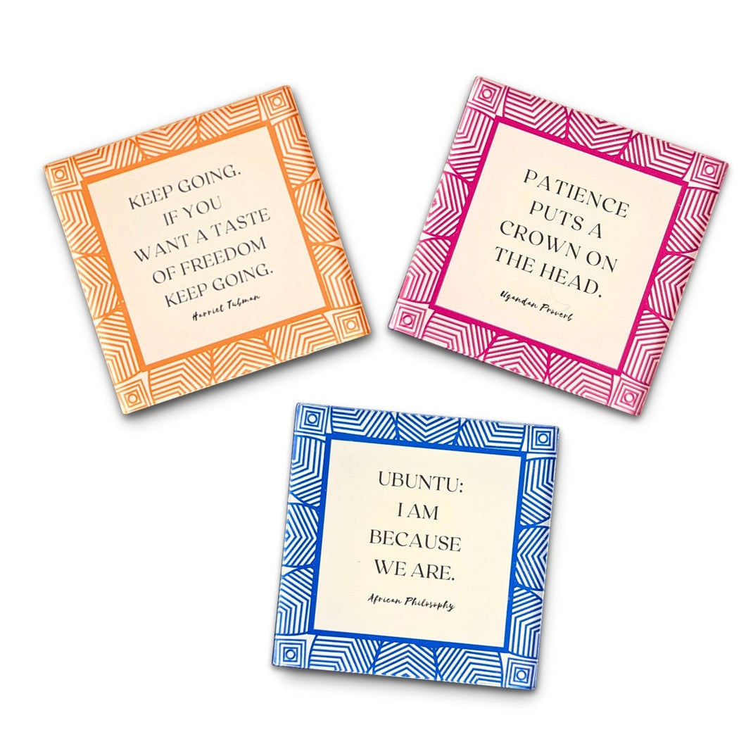 Three motivational magnets with quotes on a white background