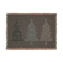 Textured blanket with geometric pattern on a white background