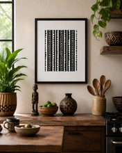 black white african fabric wall art styled in kitchen