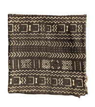 Black and white patterned fabric on a white background