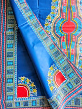 Colorful African fabric with intricate patterns on a blue background
