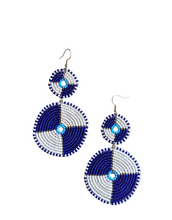 Pair of beaded earrings with blue and white design on a white background