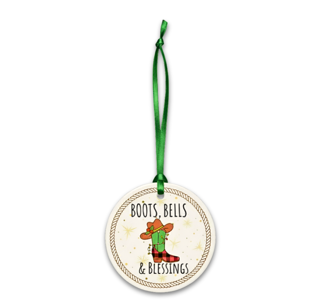Decorative ornament with 'Boots, Bells & Blessings' text and cactus illustration on a white background.