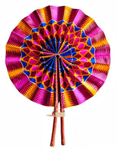 A colorful, circular hand fan with a vibrant geometric mandala pattern in pink, orange, yellow, and blue, supported by two leather handles tied together with a string.