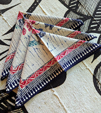 Set of patterned table napkins on a textured surface