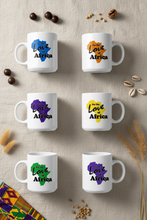 Set of six white mugs with 'Love Africa' design in various colors on a textured surface.