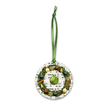 Decorative Christmas ornament with a wreath design on a white background