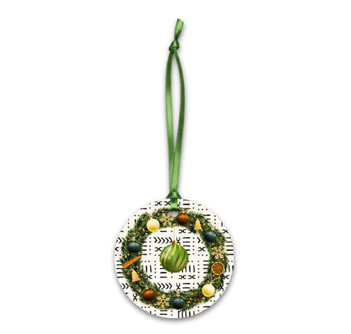 Decorative Christmas ornament with a wreath design on a white background