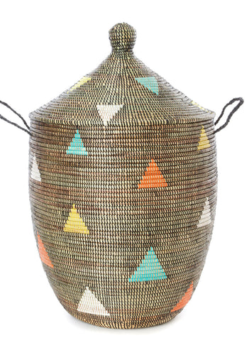 Woven basket with geometric patterns on a white background