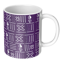 ceramic coffee mug with purple and white african pattern on it. 11 ounces