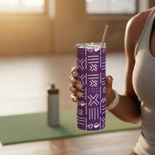 Purple tumbler with white geometric pattern and silver straw on a white background