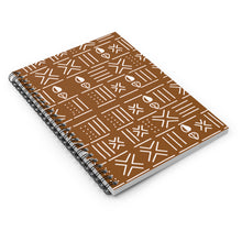 A spiral-bound notebook with a brown cover featuring a white geometric tribal-style pattern, shown on a clean white background.