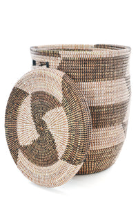 Woven basket with a lid on a white background