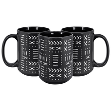 three black white african pattern coffee mugs15 oz on a blank background
