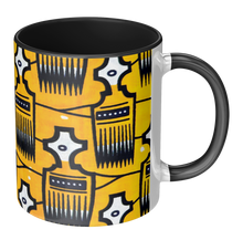 yellow coffee mug with black and white tribal combs design