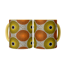 two yellow orange african pattern coffee mugs