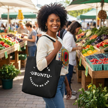 woman at farmers market with black canvas totebag