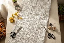 Black geometric patterns on a white background