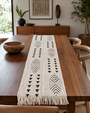 white black African pattern table runner on wood dining table