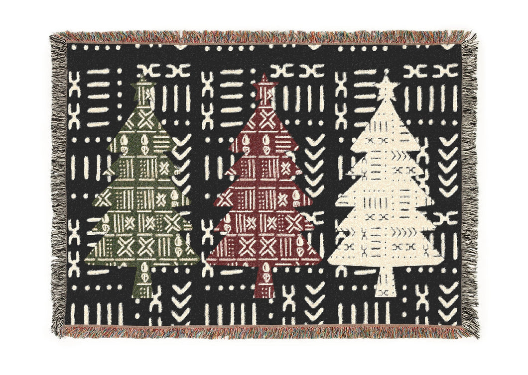 Woven blanket with geometric patterns on a black background