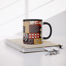 xo tribal pattern african design coffee mug on book