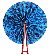 Blue decorative fan with black patterns on a white background