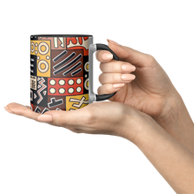 woman holding an xo african pattern coffee mug