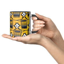yellow black african combs pattern coffee mug in hand