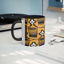 yellow black african combs design coffee mug on desk