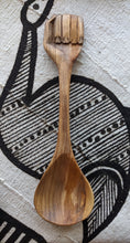 large-wood-spoon-black-fist-handle