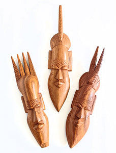 african wood masks masculine faces