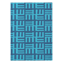 Back view of  blue hard cover journal with abstract African patterns