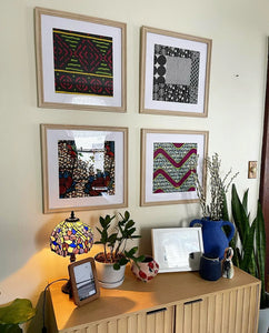 gallery wall with framed african fabrics