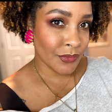 author-ijeoma-oluo-wearing-ankara-african-fabric-button-earrings