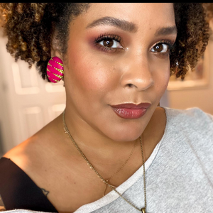 author-ijeoma-oluo-wearing-ankara-african-fabric-button-earrings