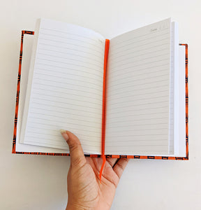 orange fabric covered journal lined pages date